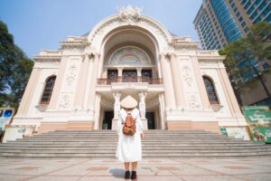 Woman,Tourist,Is,Sightseeing,At,The,Saigon,Opera,House,In - Fareast247