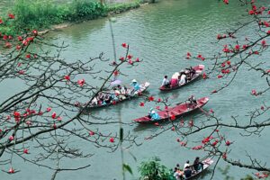 Hanoi - Huong Pagoda Festival People Sailing River - fareast247